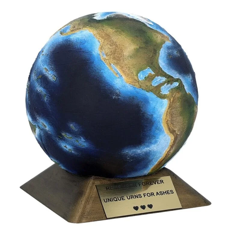 Earth-shaped baby urn with an artistic hand-painted finish in blues and greens