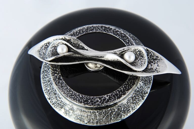 glass urn with calla lily