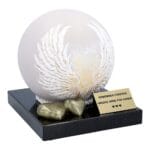 urn with white wings