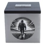 Front of cremation urn with soldier walking into sunset engraving