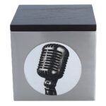 Front close-up of the urn for ashes with a vintage microphone design