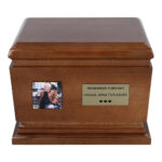 Front view of wooden urn with memorial photo