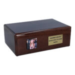 Wooden funeral urn with photo and memorial plaque