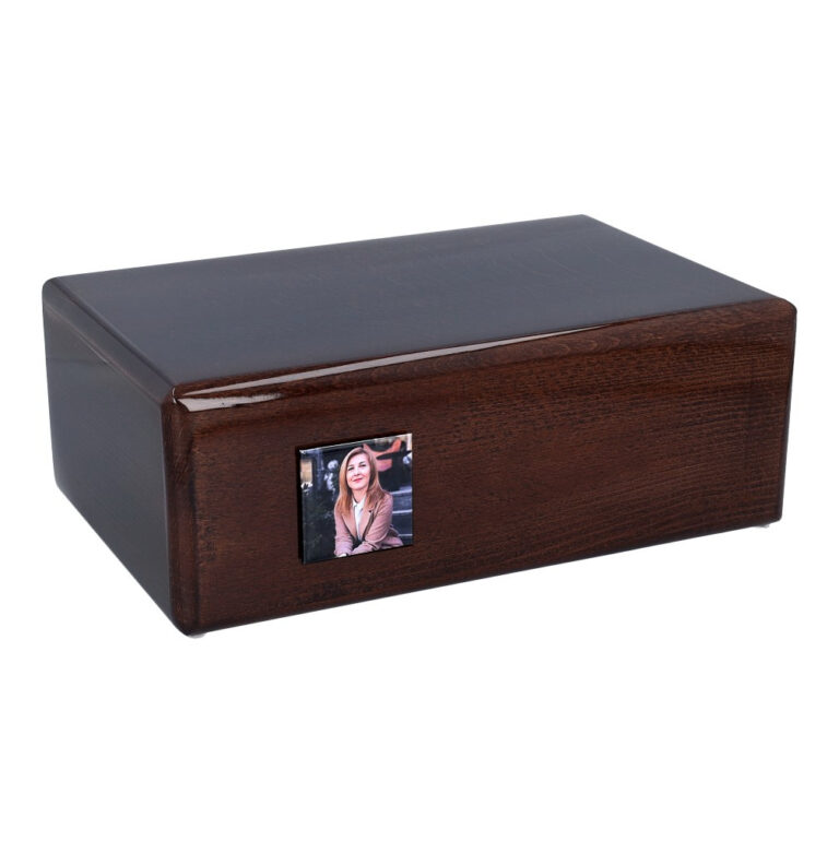 Angled view of solid wooden cremation urn