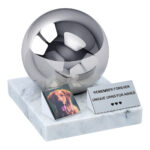 Pet urn for dog on marble base with memorial plaque and photo tile