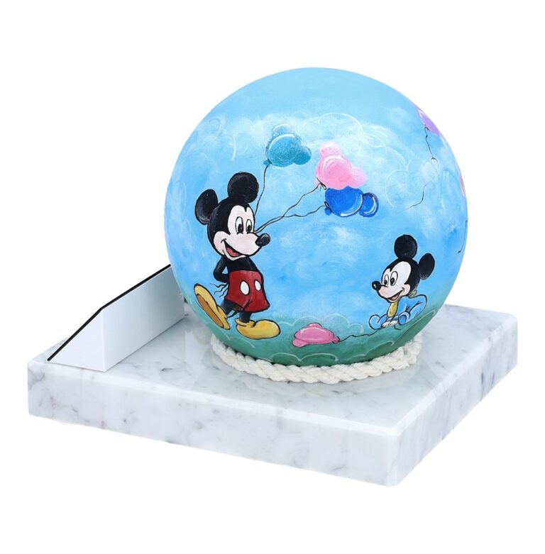 Blue children’s urn with painted cartoon characters and pastel balloons.