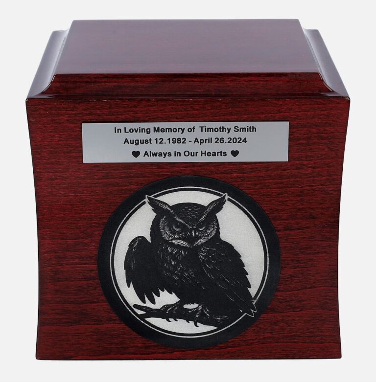Cremation urn with owl engraving and “In Loving Memory” plaque, centered view.