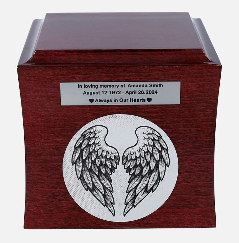 Urn front: angel wings engraving with memorial nameplate above.