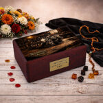 Mechanic memorial urn displayed with flowers and tools, automotive themed urn