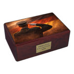 Wooden cremation urn with saluting soldier and German flag tribute design isolated on white background