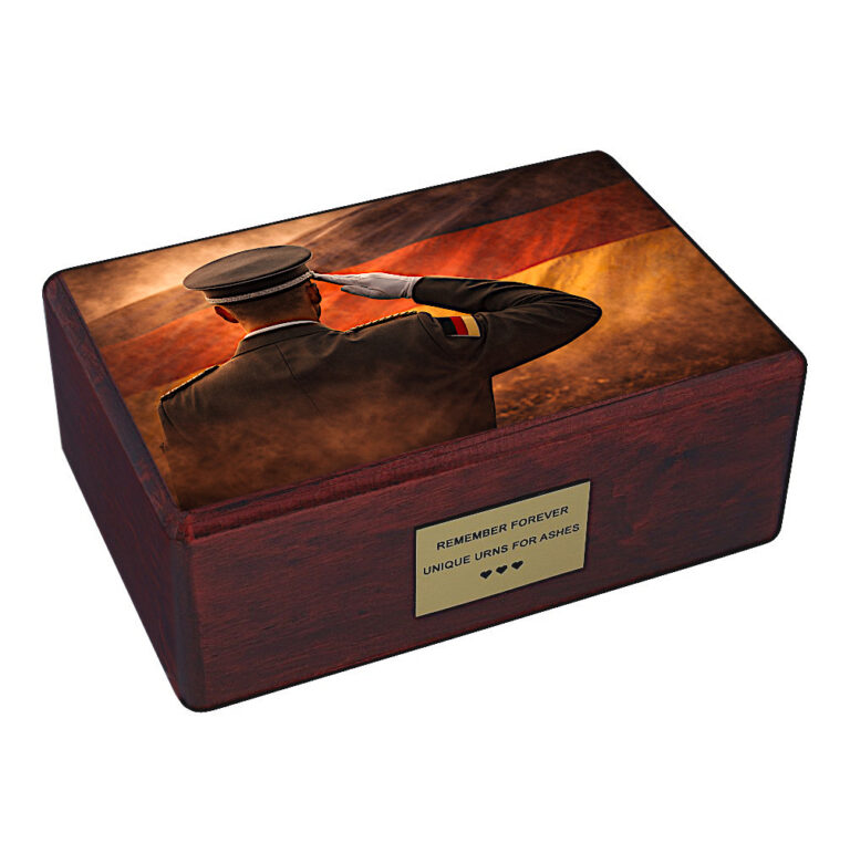 Wooden cremation urn with saluting soldier and German flag tribute design isolated on white background