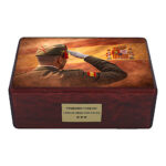 Front view of rectangular wooden urn with Spain flag and military tribute artwork