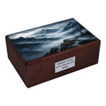 Wooden cremation urn with mountain landscape lid angled view beech wood memorial urn
