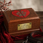 Wooden Dog Cremation Urn with Broken Red Heart Paw Print displayed in an elegant memorial setting.