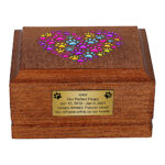 Front view of Wooden Pet Cremation Urn with Colorful Paw Print Heart Design.