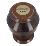 Top view of premium dark brown solid oak cremation urn