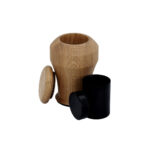 Wooden keepsake urn with removable inner container.