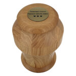 Top view of premium solid oak cremation urn.