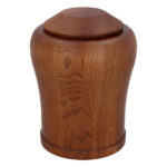 Solid oak wooden cremation urn in walnut finish.