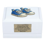White Wooden Baby Cremation Urn with Blue Baby Shoes – Front View Memorial Urn for Child Ashes