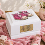 Pink Baby Shoes Baby Cremation Urn Displayed in a Gentle Memorial Setting